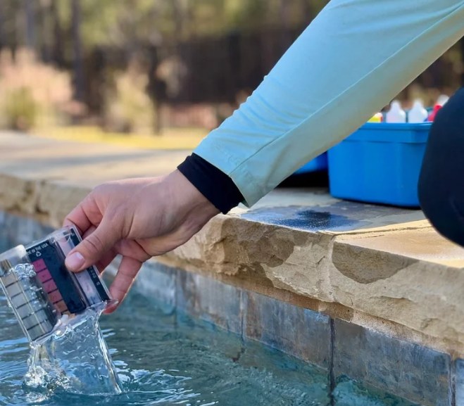 Testing pool water chemistry poolside